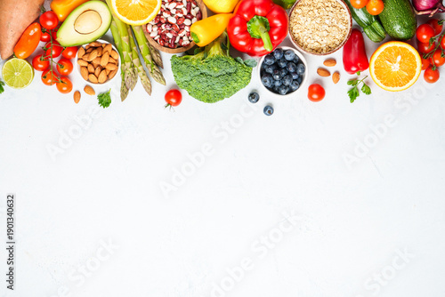 Healthy food assortment on white background.