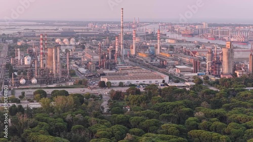 Wallpaper Mural Aerial view of industrial and port area of Ravenna,production district is made up of a chemical and petrochemical pole, thermoelectric and metallurgical plants at sunset Torontodigital.ca