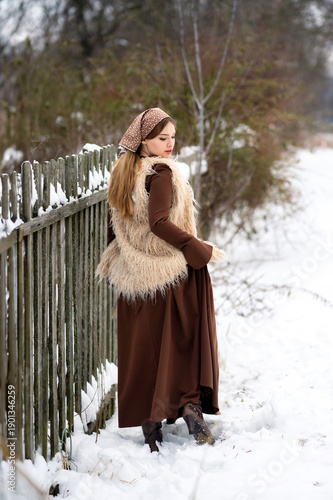 Young Woman Holding Basket of Apples in Snowy Winter Forest, Rustic Lifestyle Portrait
