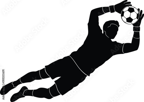 Soccer goalkeeper diving to catch ball