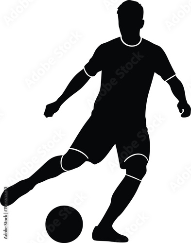 Soccer player kicking a ball in black silhouette