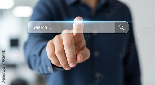 Finger touching a digital search bar

