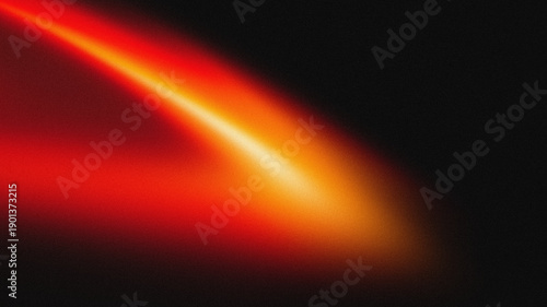 Fotografie Abstract red and orange light leak with film grain texture on black background