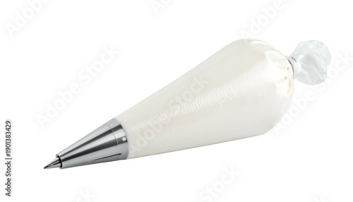 A white pastry bag, filled with cream, with a metal tip, tied closed, against a black background