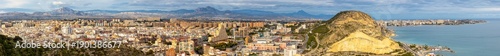 Ultra-high resolution panoramic view of metropolitan Alicante cityscape with central and northern urban districts, Serra Grossa hill and Mediterranean Sea bay of Valentia region of Spain