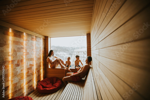 Family enjoys time in sauna...