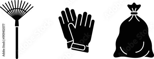 Gardening tools including a rake, gloves, and trash bag for yard work and cleanup