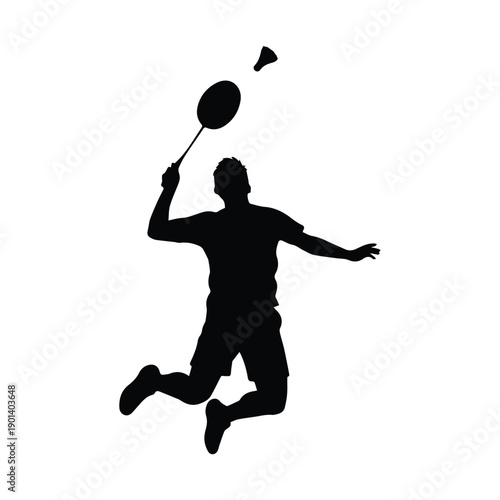 Dynamic badminton player in mid jump with racket and shuttlecock