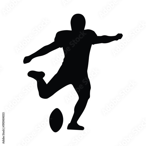 Rugby player kicking ball in dynamic action pose