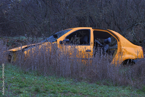 Abandoned yellow car