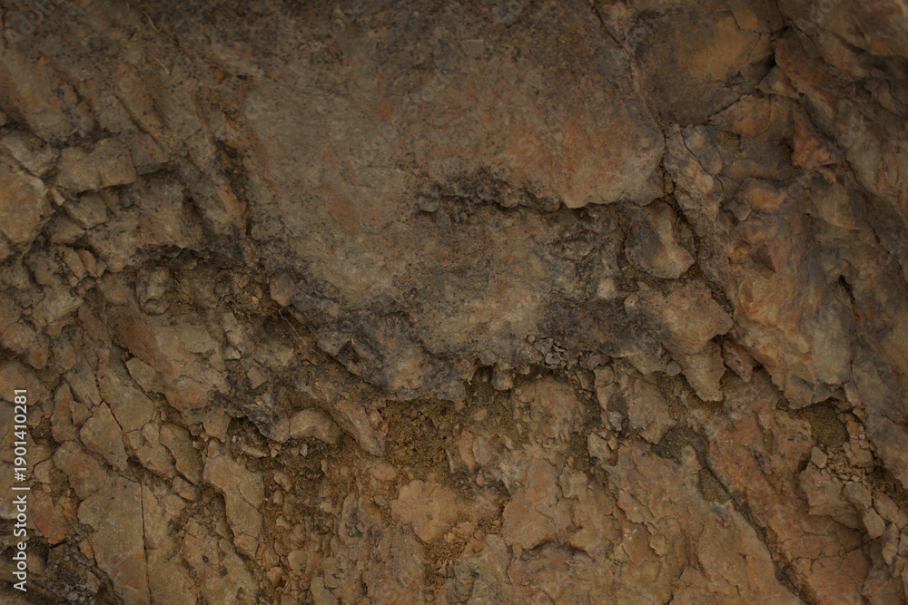 Fototapeta premium Natural rough rock texture background, weathered stone surface details