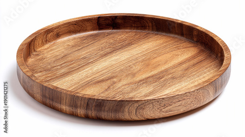 Wooden round plate on a clean surface for serving food or decoration