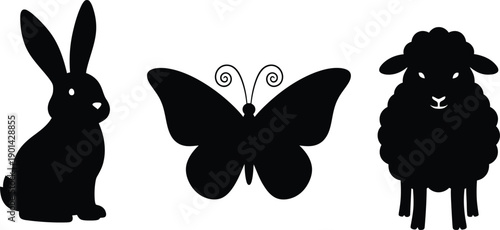 Black silhouettes of a rabbit butterfly and sheep