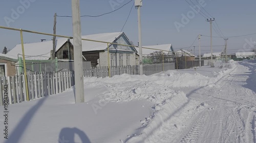   winter road in a Russian village
