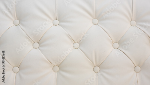 Cuadro en lienzo Cream colored tufted leather upholstery with elegant buttons, luxurious interior