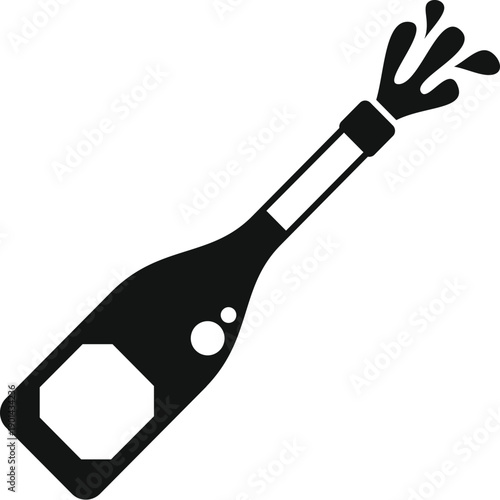 Champagne bottle spraying sparkling fizz in a celebration concept