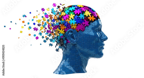Abstract blue head made of colorful puzzle pieces dissolving, representing memory loss or cognitive process.