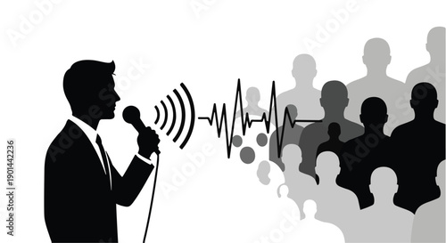Silhouette of businessman speaking into microphone to engaged audience