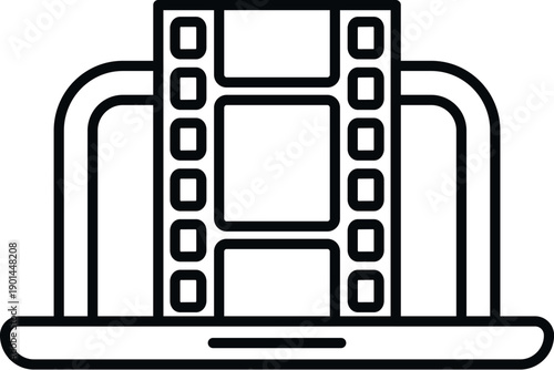 Filmstrip on a laptop screen symbolizing video production and digital movie editing