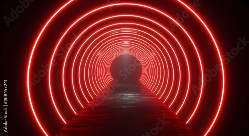 A person walks through a dark tunnel with vibrant red neon lights