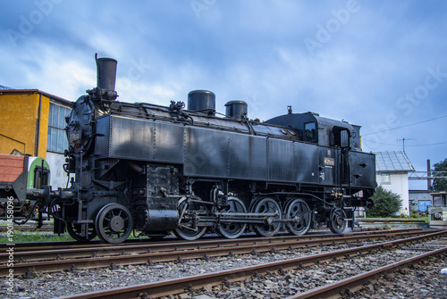 steam locomotive resting in the depot before performance