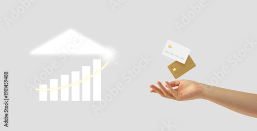hand holding credit cards, rising graph under roof icon showing mortgage growth and property value increase, financial advisor presenting steady bar chart, neutral background, optimistic