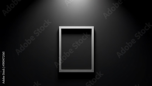 Empty white picture frame with thin border displayed against a minimalist dark setting for modern decor ideas