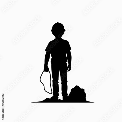 Silhouette of Young Child Playing with Jump Rope Near Pile of Sand in Outdoor Setting Capturing Essence of Childhood and Imagination in Playful Scene