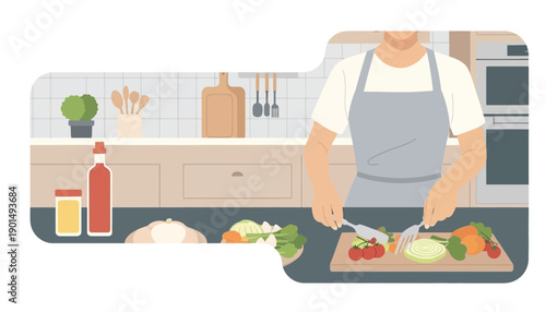 A person in an apron skillfully chopping fresh vegetables on a cutting board in a modern kitchen