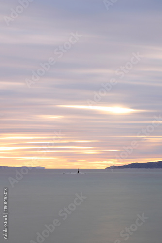 sunset on the beach. Seaside town of Turgutreis and spectacular sunsets. Selective Focus. Long Exposure shoot. tranquility scene.