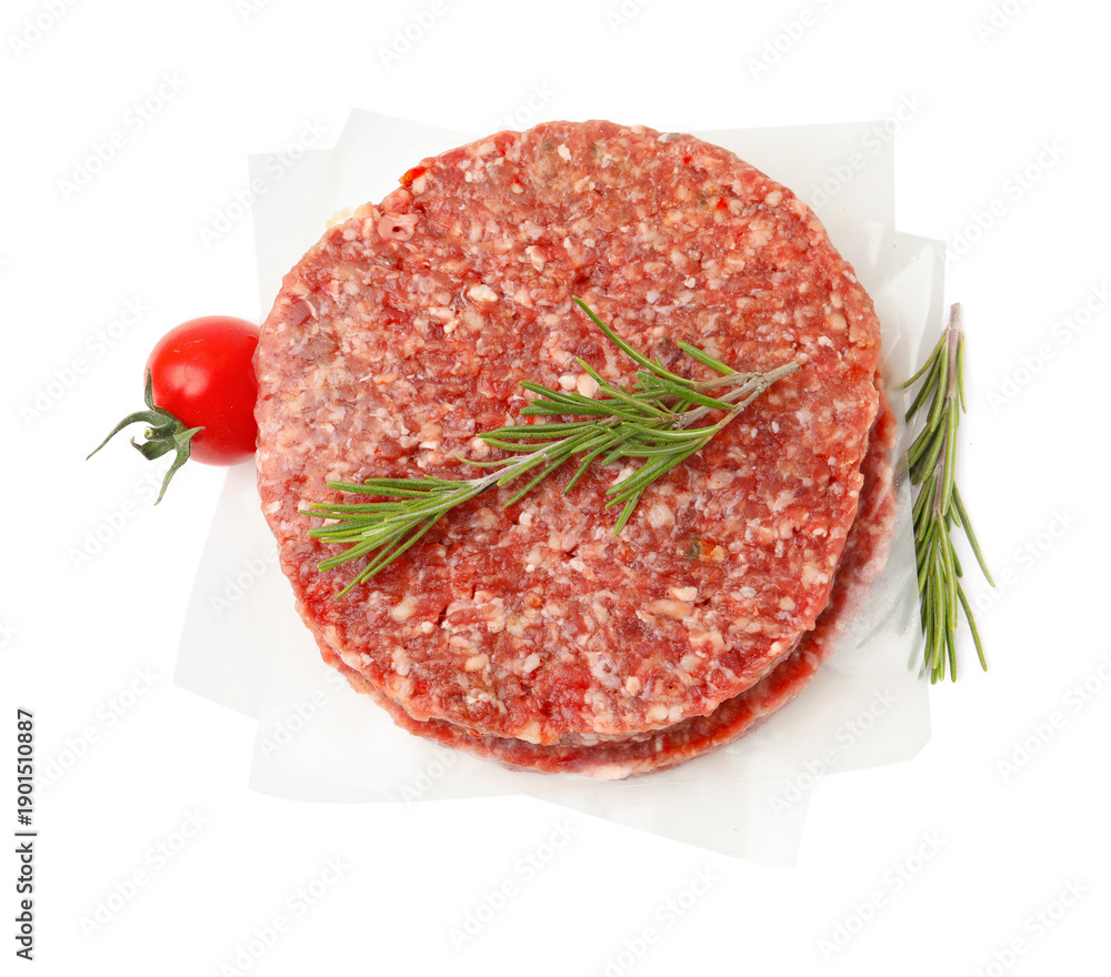 Fototapeta premium Uncooked meat patties with rosemary and tomato isolated on white, top view
