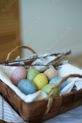 Easter eggs in a basket. Preparation for Easter celebration.