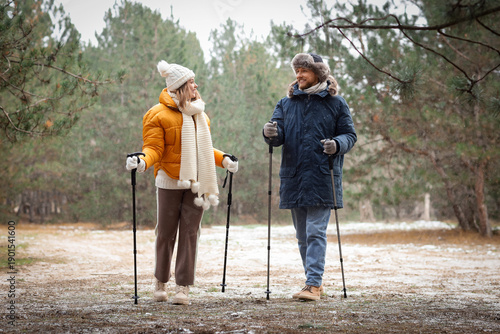 Young couple with walking p...