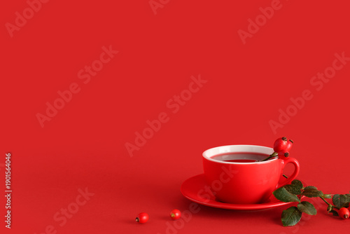 Cup of hot rose hip tea and...
