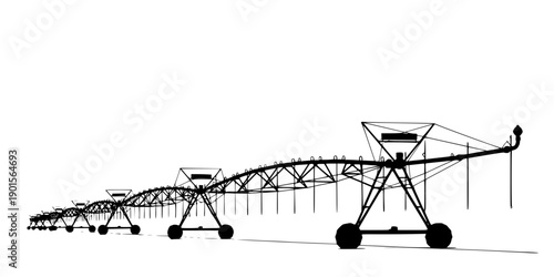 Large center pivot irrigation system silhouette isolated on white background
