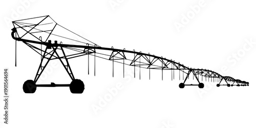 Large center pivot irrigation system silhouette isolated on white background
