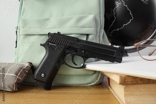 Backpack with gun, globe an...