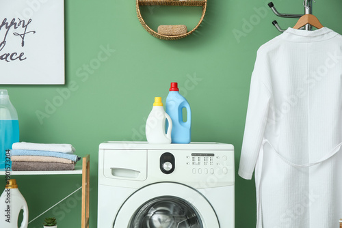 Stylish laundry room with m...