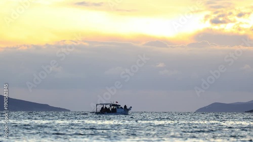 boat on the sea. A fishing boat sailing in the evening.. Turgutreis, bodrum, turkey.