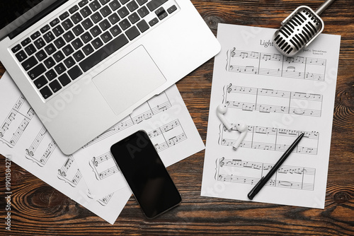 Music sheets with laptop, m...