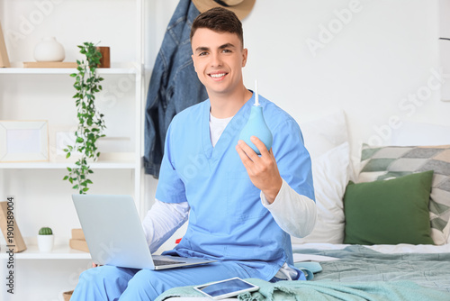 Male medical student with e...