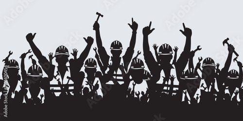 Silhouette of construction workers celebrating with raised arms and tools.