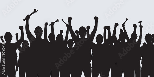 Silhouette of a crowd of workers raising their fists and tools in protest or celebration.