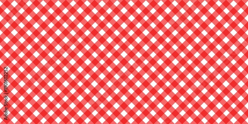 Red and white diagonal gingham pattern background. Seamless checkered fabric texture for picnic tablecloth, napkins, or kitchen wallpaper. Classic traditional textile design.