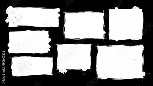 Collection of seven rough white rectangles on a black background.