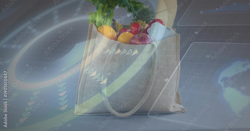 Fototapeta premium Showing beige canvas tote holding greens, baguette, fruit, carton on gray table, HUD overlays