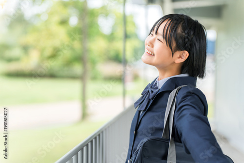 Free Download Elementary school, junior high school, and high school girls in uniforms taking a deep breath in a school building - GFXLoad