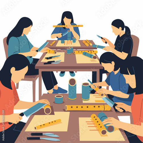 Group of women in a creative workshop making handmade flutes.