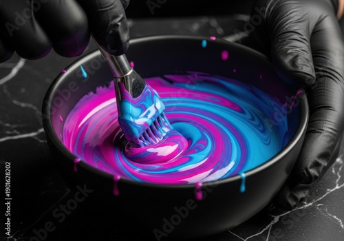 A close-up macro shot of a colorist's hands mixing vibrant hair dye in a ceramic bowl.