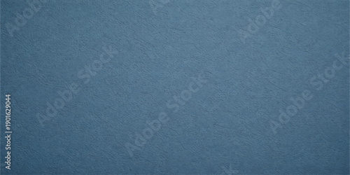 A seamless blue denim fabric texture provides a rough cotton material surface with a dark grunge pattern, ideal for a blank clothing design backdrop or wallpaper